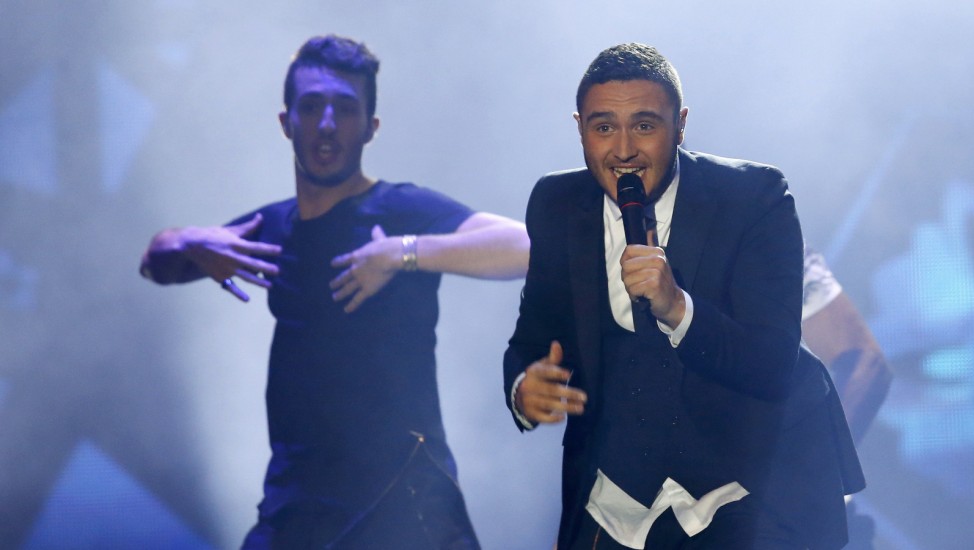 Singer Guedj of Israel performs the song 'Golden Boy' during the final of the 60th annual Eurovision Song Contest in Vienna
