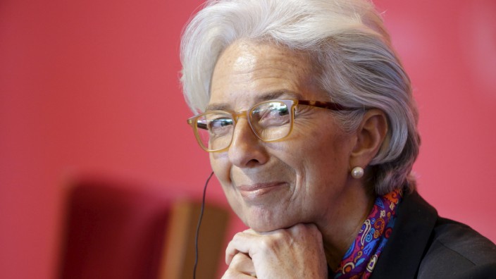 Lagarde smiles as she attends the China Development Forum in Beijing