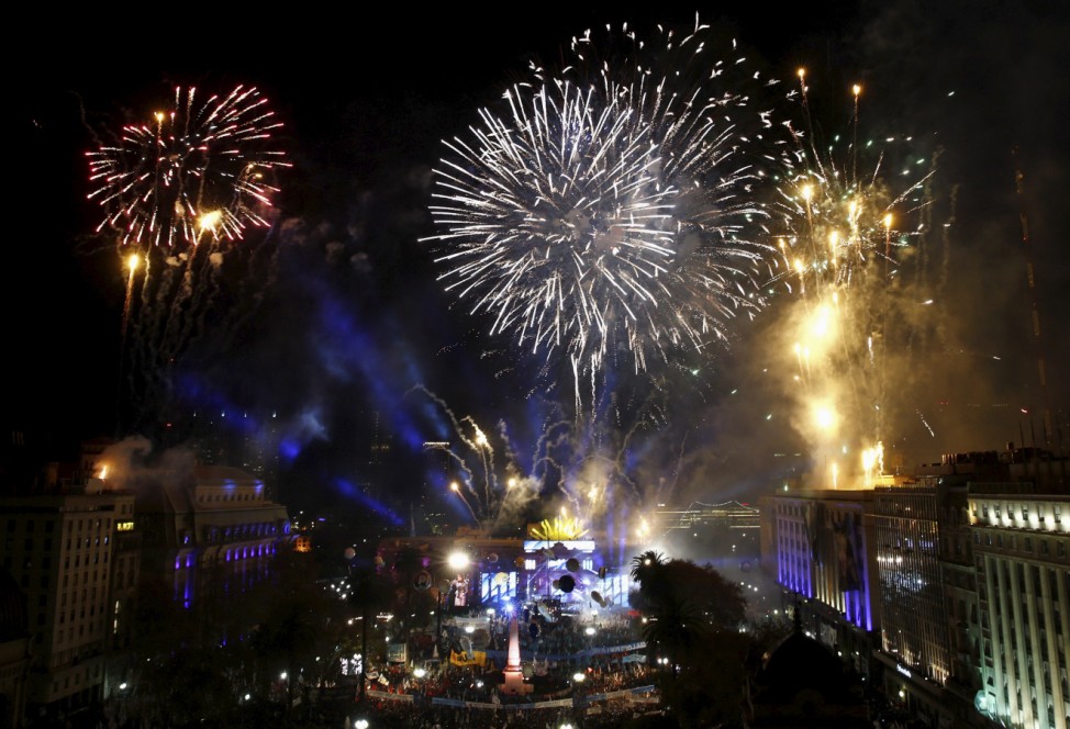 Fireworks explode over the Casa Rosada Presidential Palace during commemorations of the 204th anniversary of the Revolucion de Mayo (May Revolution) in Buenos Aires