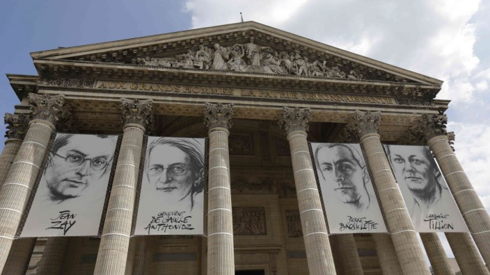 The portraits of four figures of the French Resistance are displayed at the Pantheon on the eve of a ceremony in Paris