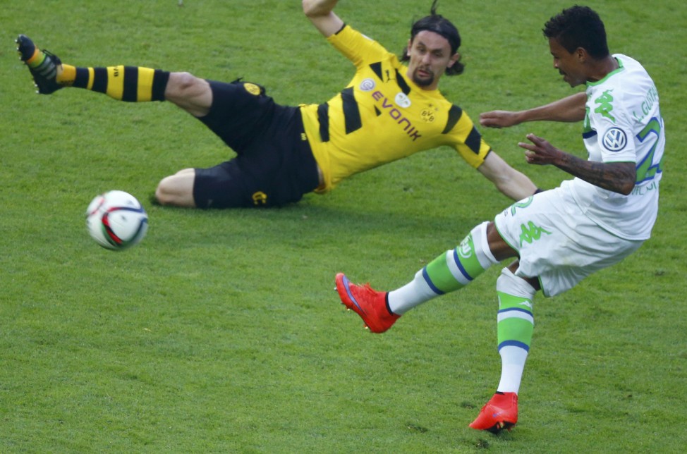 VfL Wolfsburg's Gustavo scores goal against Borussia Dortmund during their German Cup final soccer match in Berlin