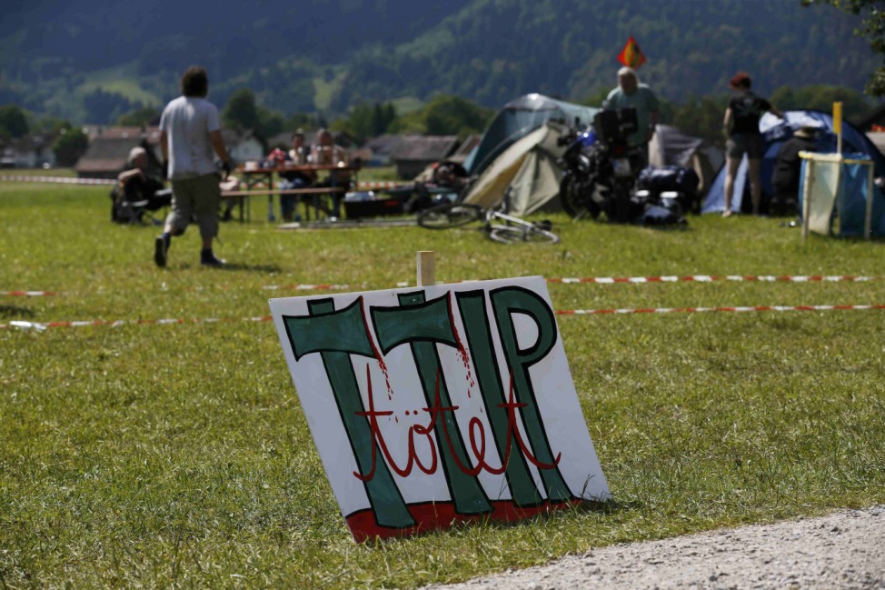 G7 opponents set up a tent camp on the field near the Loisach river in the outskirts of Garmisch-Partenkirchen