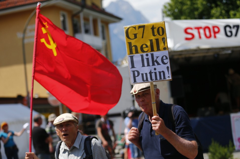 Two elederly G7 opponents arrive at the protestor's camp on the outskirts of Garmisch-Partenkirchen