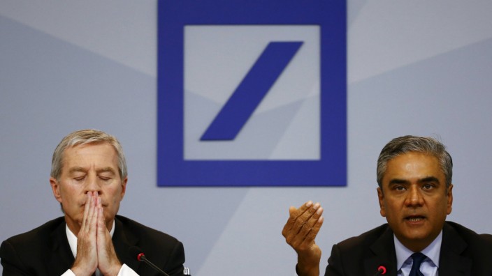 Jain and Fitschen, co-CEOs of Deutsche Bank, address a news conference in Frankfurt