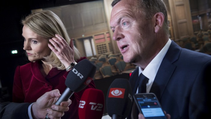 Denmark's Prime Minister Helle Thorning-Schmidt and opposition leader Lars Lokke Rasmussen attend their last televised debate with all party leaders in Copenhagen