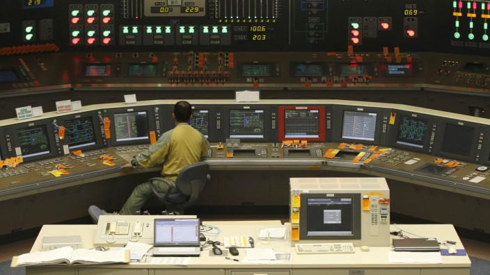 An employee works in the central control room of the No.5 reactor at Chubu Electric Power Co.'s Hamaoka Nuclear Power Station in Omaezaki