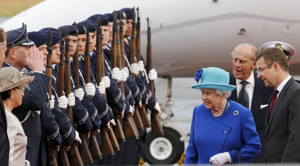 Britain's Queen Elizabeth and Prince Philip are welcomed on arrival at Tegal airport in Berlin