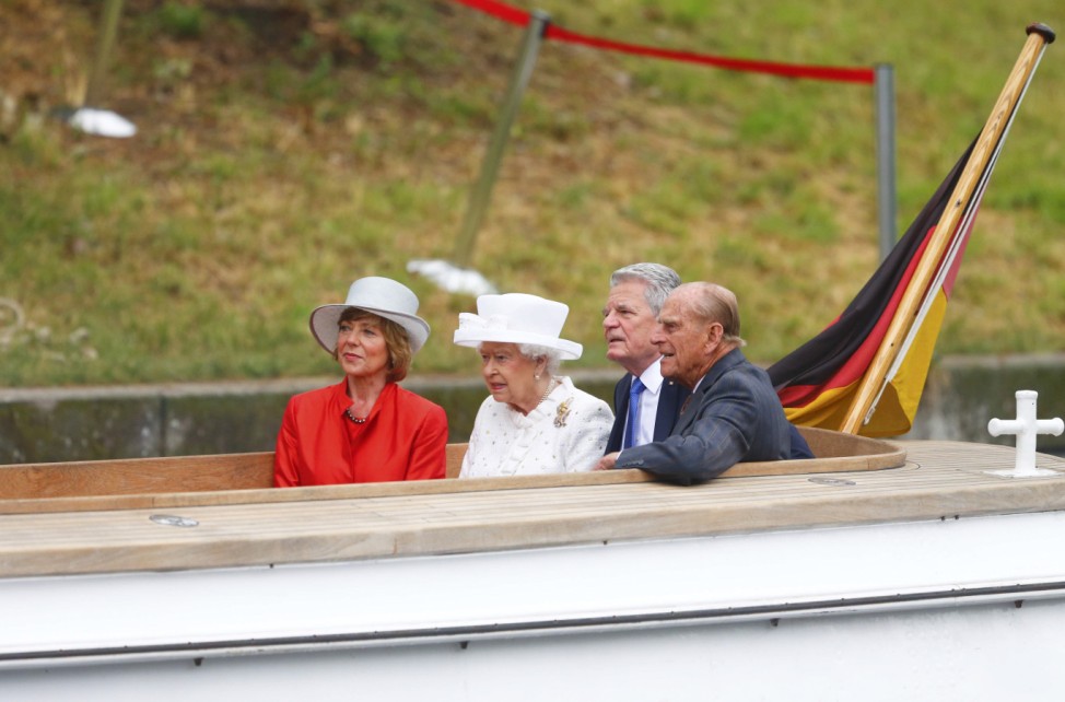German President Gauck, his partner Schadt and Britain's Queen Elizabeth and Prince Philip take a boat trip on Spree river in Berlin