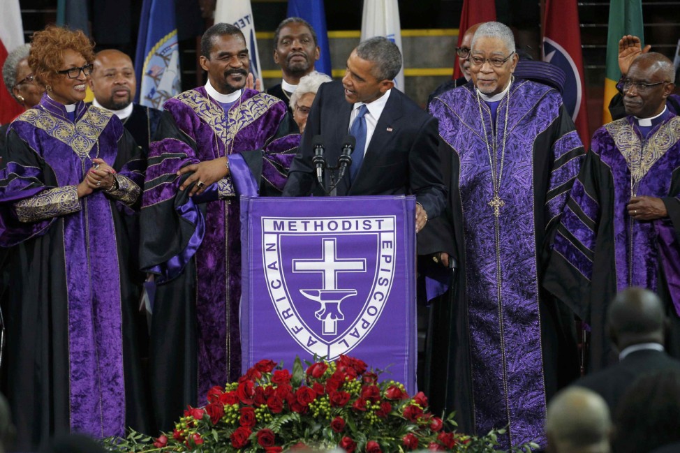 U.S. President Obama  leads mourners in singing 'Amazing Grace' during funeral services for the Rev. Clementa Pinckney in Charleston