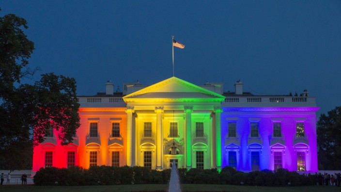 The White House is illuminated with rainbow colors
