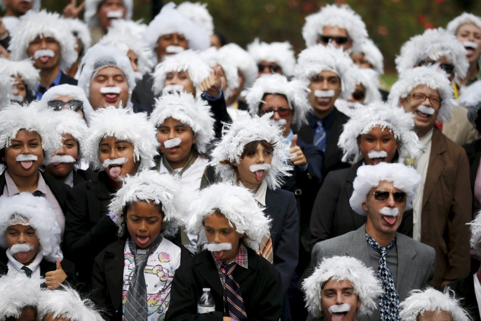 People dressed as Albert Einstein gather to establish a Guinness world record for the largest Einstein gathering, to raise money for School on Wheels and homeless children's education, in Los Angeles