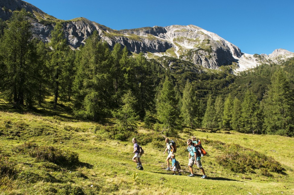 Austria Salzburg Family walking on mountains at Altenmarkt Zauchensee model released PUBLICATIONxI