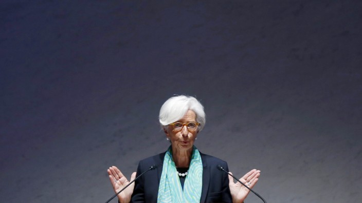 IMF Managing Director Lagarde gestures as she gives a speech during World Assembly for Women in Tokyo