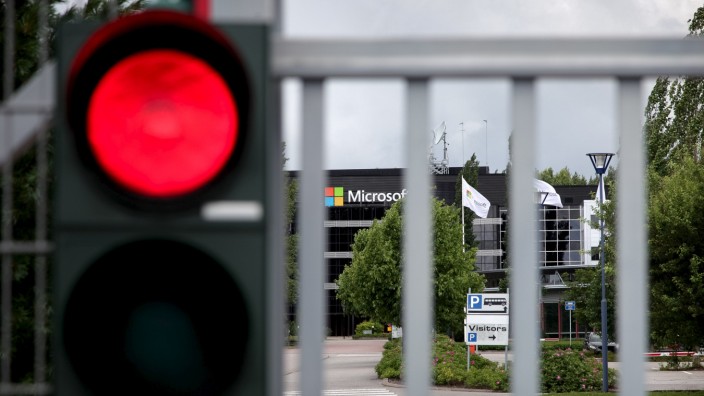 A Microsoft factory is seen behind a gate in Salo