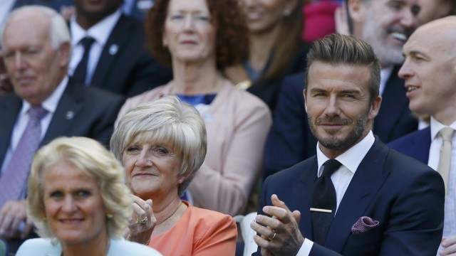 Former footballer David Beckham and his mother Sandra Beckham at the Wimbledon Tennis Championships in London
