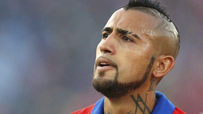 Chile's Arturo Vidal leaves the pitch at halftime during their Copa America 2015 final soccer match against Argentina at the National Stadium in Santiago