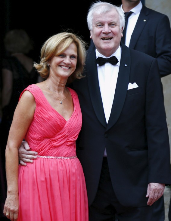 Bavarian state prime minister Horst Seehofer and his wife Karin arrive at the red carpet for the opening of the Bayreuth Wagner opera festival outside the Gruener Huegel (Green Hill) opera house in Bayreuth