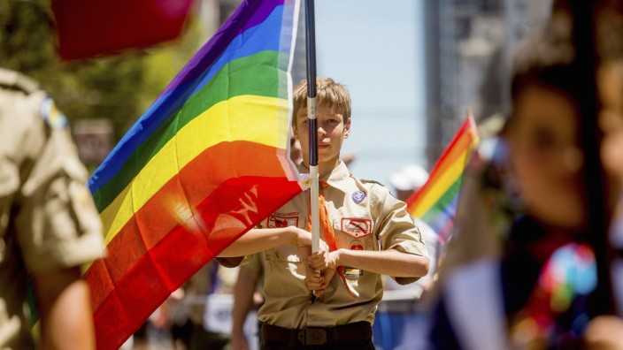 File photo of Boy Scout Casey Chambers carrying a rainbow flag during the San Francisco Gay Pride Festival in California