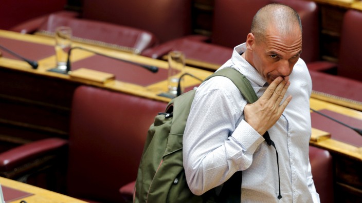 Former Greek Finance Minister Yanis Varoufakis reacts during a parliamentary session in Athens