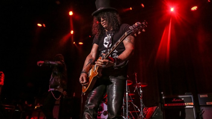 Rock: Sie klingen wie in alten Zeiten, nur macht es ihnen jetzt viel mehr Spaß als früher: Ex-"Guns"-Gitarrist Slash auf der Bühne in San Francisco.