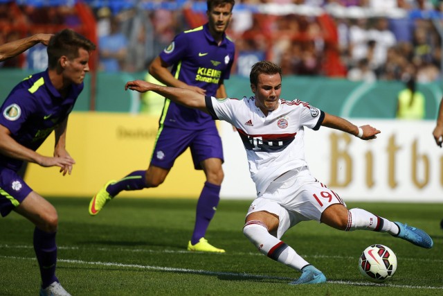 Goetze of Bayern Munich shoots to score a goal against fifth division club FC Noettingen during their German cup (DFB Pokal) first round soccer match in Karlsruhe
