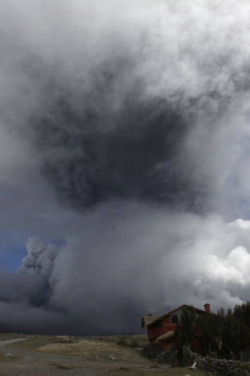 The Cotopaxi volcano spews ash and vapor in the National Park Cotopaxi in Ecuador