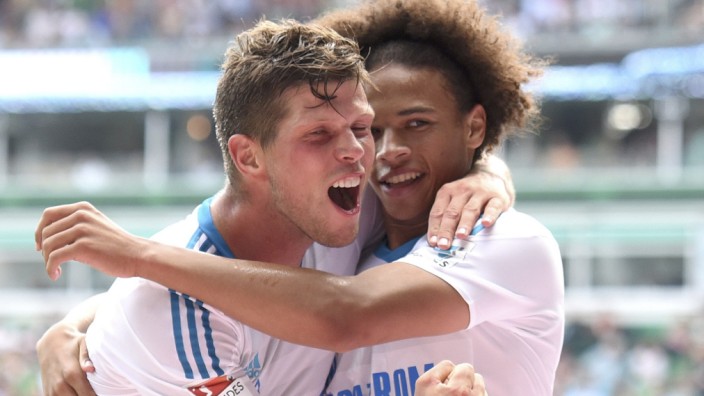 Schalke 04's Huntelaar celebrates his goal with teammate Sane during their German first division Bundesliga soccer match against Werder Bremen in Bremen