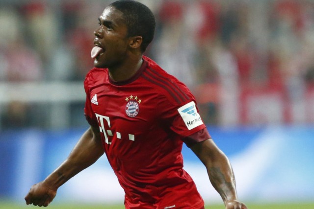 Bayern Munich's Costa celebrates after scoring goal against Hamburger SV in Bundesliga soccer match in Munich