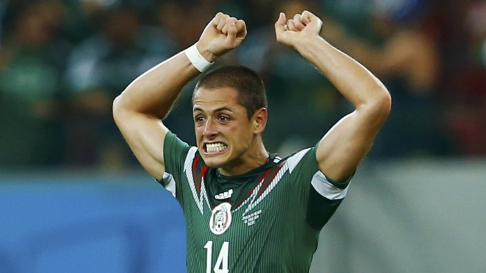 Mexico's Hernandez celebrates after scoring a goal during their 2014 World Cup Group A soccer match against Croatia at the Pernambuco Arena in Recife