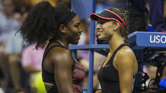 Williams of the U.S. talks to Diatchenko of Russia after Diatchenko retired from their match after an injury at the U.S. Open Championships tennis tournament in New York