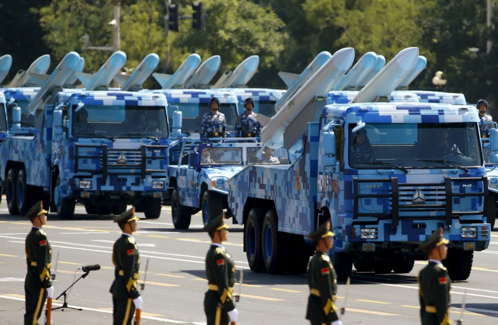 Marine corps vehicles carrying ship-to-air missiles drive past the Tiananmen Square during the military parade marking the 70th anniversary of the end of World War Two, in Beijing