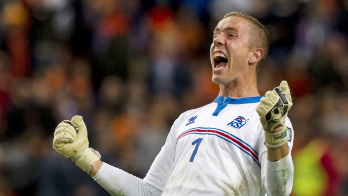Goalkeeper Hannes Halldorsson of Iceland celebrates Iceland's victory over the Netherlands after their Euro 2016 qualifying soccer match in Amsterdam