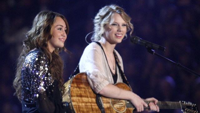 Taylor Swift and Miley Cyrus perform at the 51st annual Grammy Awards in Los Angeles