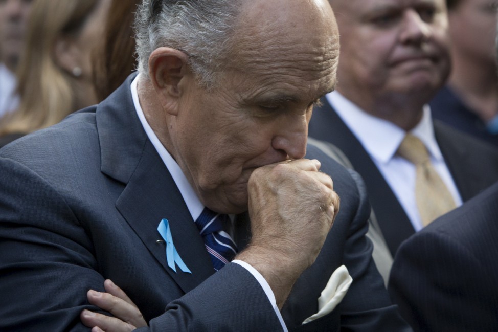 Former New York City Mayor Rudy Giuliani pauses during a ceremony marking the 14th anniversary of the 9/11 attacks, at the National September 11 Memorial and Museum in Lower Manhattan in New York