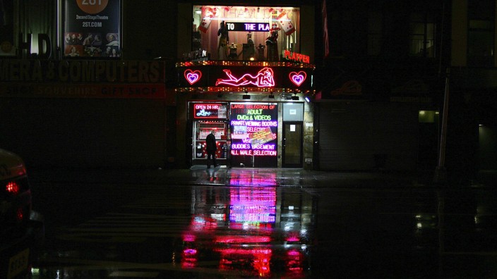 A sex shop is seen open near Times Square ahead of Hurricane Sandy in New York