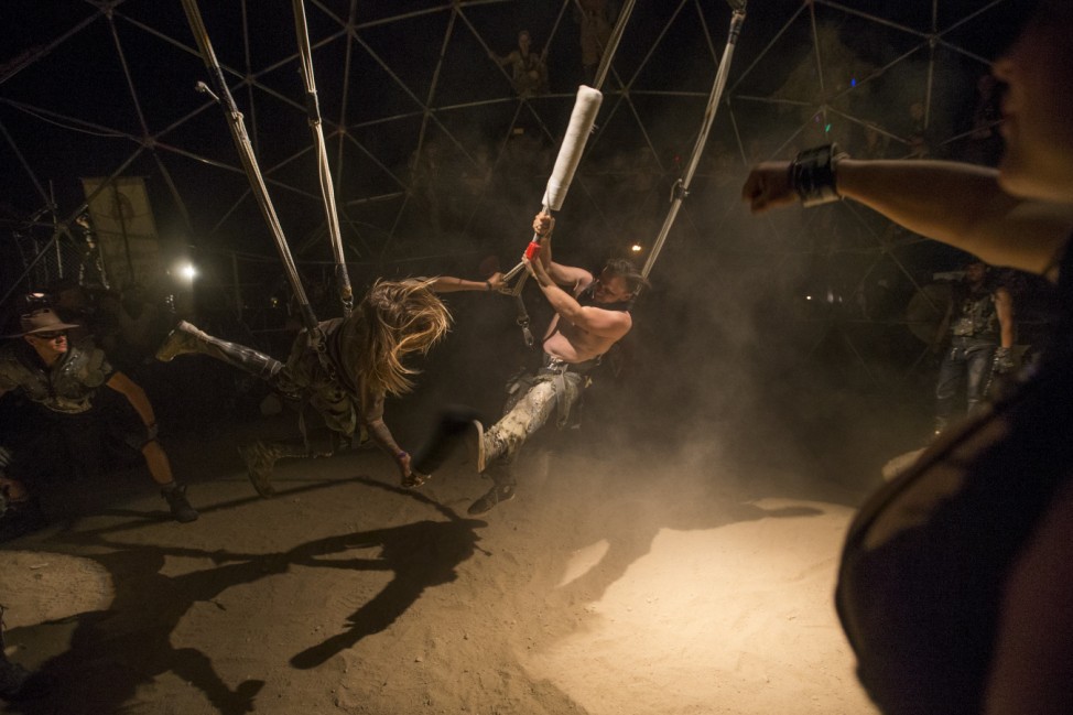 Enthusiasts fight at the Thunderdome during Wasteland Weekend event in California City