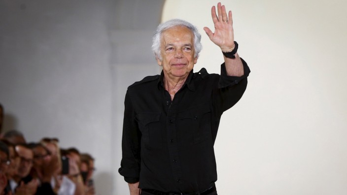 File photo of designer Ralph Lauren acknowledging the crowd after presenting his Spring/Summer 2015 collection during New York Fashion Week