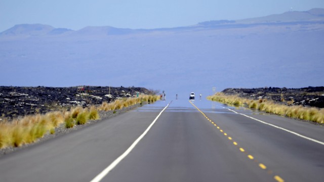 Ironman auf Hawaii: Die Radstrecke beim Ironman Hawaii gilt als besonders hart. Auf einer Runde geht es 180 Kilometer lang bei tückischen Seitenwinden durch die Wüste.