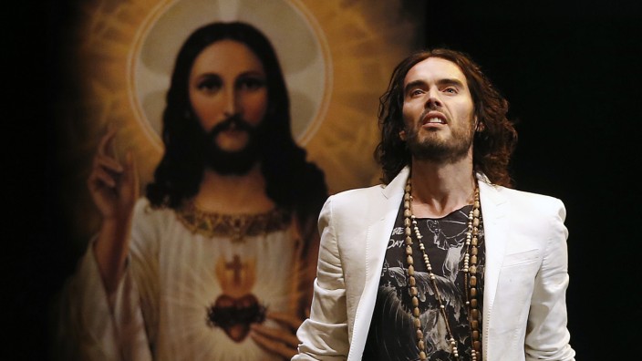 British comedian Russell Brand performs at his Messiah Complex show in London