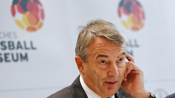 Niersbach, the German Soccer Association President, reacts on stage at Germany's new soccer museum in Dortmund