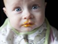 Portrait of baby boy against black background close up model released PUBLICATIONxINxGERxSUIxAUTxHU