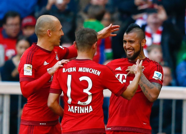 Munich's Robben celebrates with team mates after he scored against Cologne during their Bundesliga first division soccer match in Munich