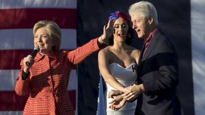 Democratic presidential candidate Hillary Clinton holds a campaign rally with her husband former President Bill Clinton and singer Katy Perry in Des Moines, Iowa