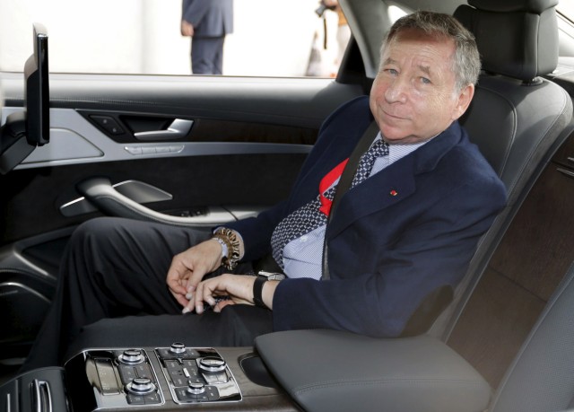 FIA President Jean Todt sits in a car during his visit to the pit lane before the start of the Le Mans 24-hour sportscar race in Le Mans