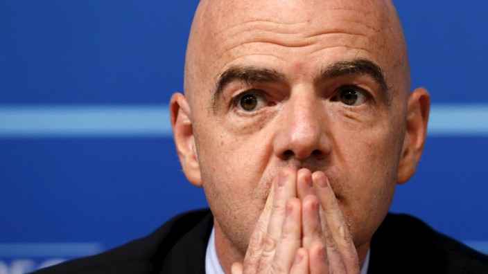 UEFA general secretary Infantino pauses during a news conference following a meeting of UEFA's executive committee in Nyon