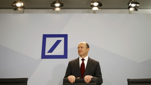 Deutsche Bank new Chief Executive John Cryan arrives for a news conference in Frankfurt