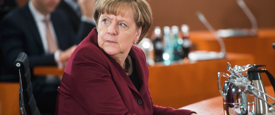 German Chancellor Merkel sits before the start of a parliamentary investigation committee hearing on RWE's Biblis nuclear power plant shutdown, at the Chancellery in Berlin