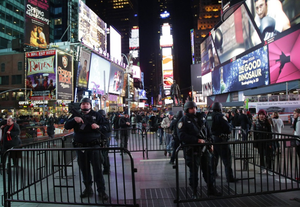 NYPD Strategic Response Group Police show a heightened security presence as they stand armed in Time