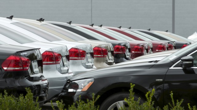 An assortment of Volkswagen Passat vehicles sit for sale at a Volkswagen dealership in San Diego