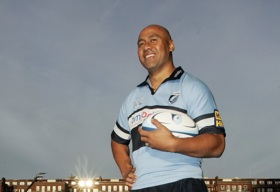 Cardiff Blues' new signing Lomu poses during a news conference in Wales